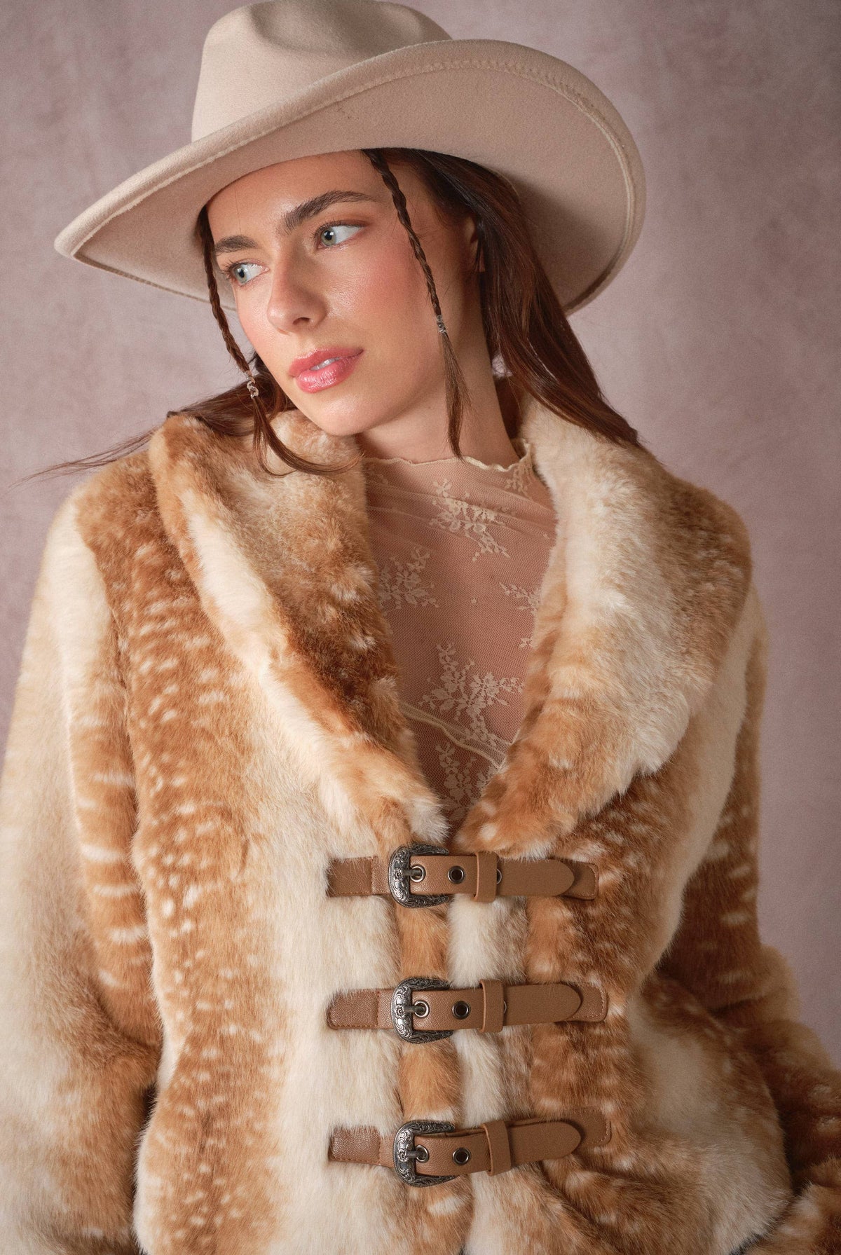 Blue B 25004J buckled faux fur jacket with deer print, featuring a stylish buckle closure and soft, textured fur material.