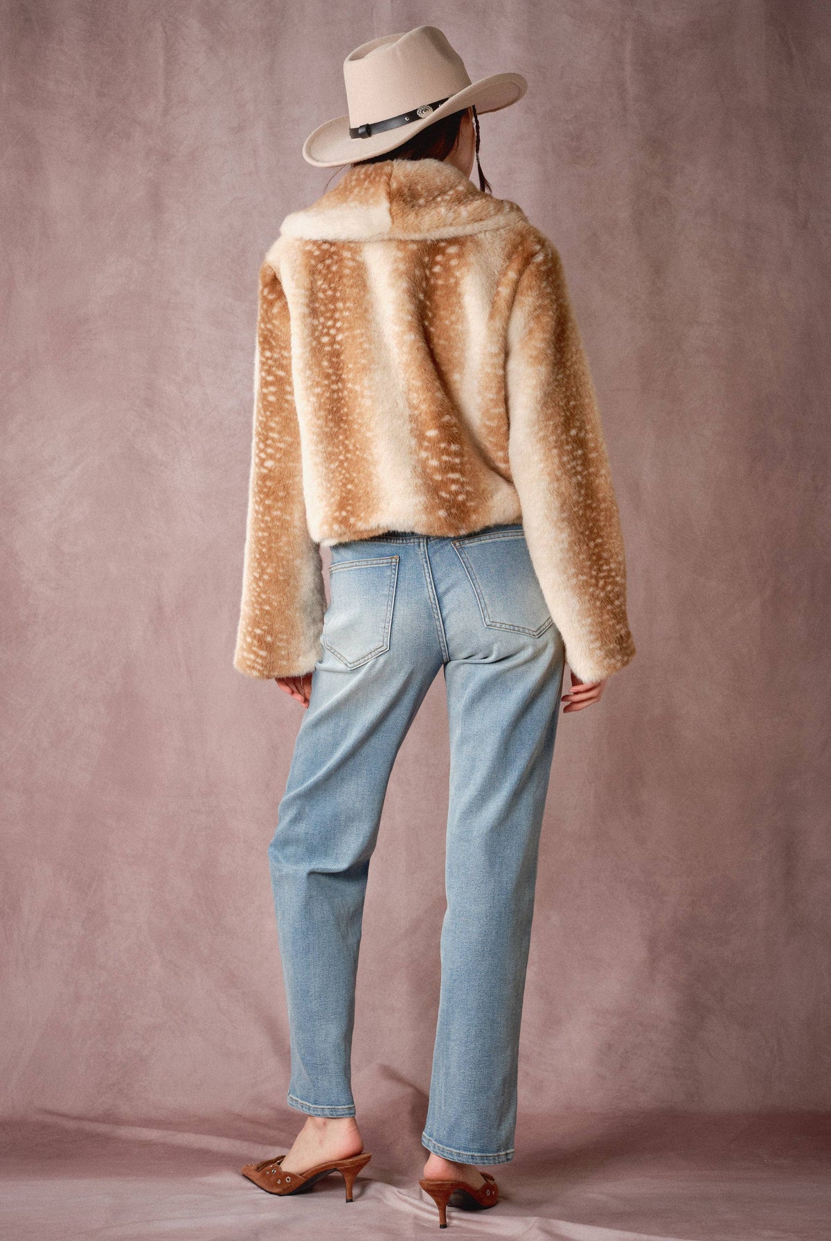 Blue B Buckled Deer Print Faux Fur Jacket showing brown deer print and buckle details on soft, cozy faux fur material.