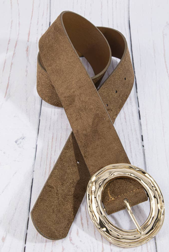 Suede hammered round buckle belt by Collections by Fame Accessories, showing close-up of tan suede strap with textured metal buckle.