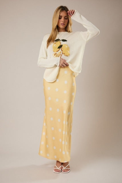RARA Boutique lemon graphic lightweight knit sweater featuring a yellow lemon print on soft, cozy fabric.