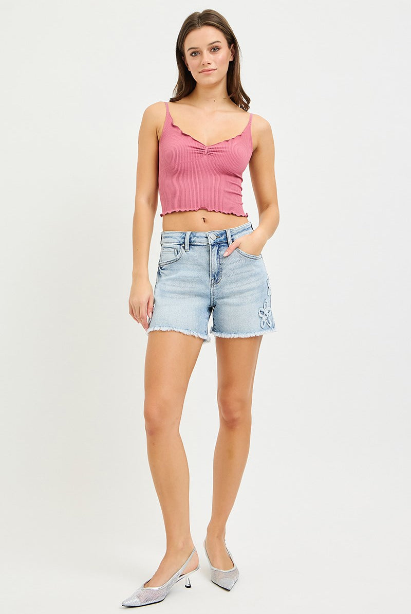 Risen floral patch high rise denim shorts with distressed details and frayed hem, casual summer fashion by RARA Boutique.
