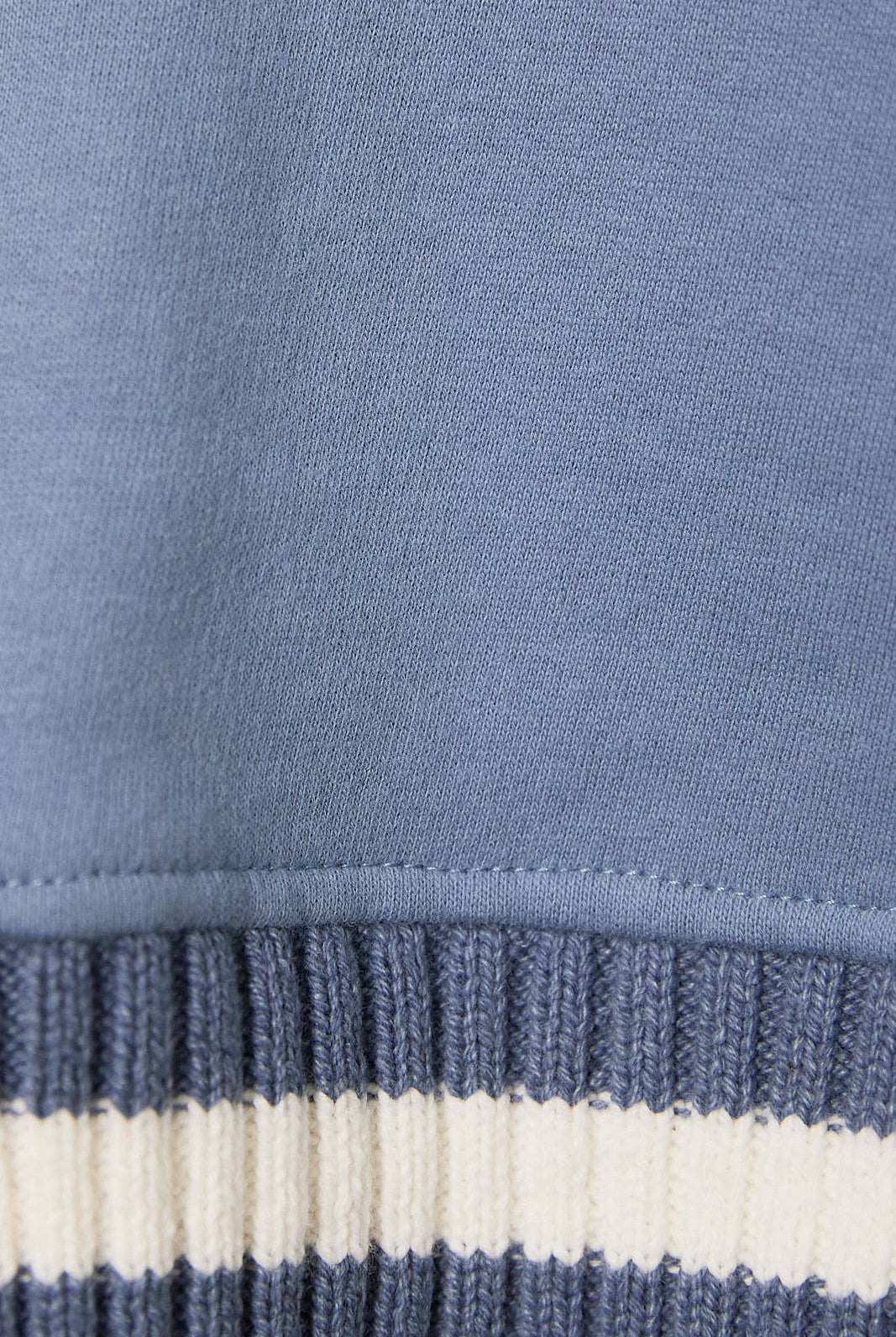 Le Lis sweatshirt featuring knit sweater sleeves, casual long-sleeve top with contrasting knit detail for cozy style.