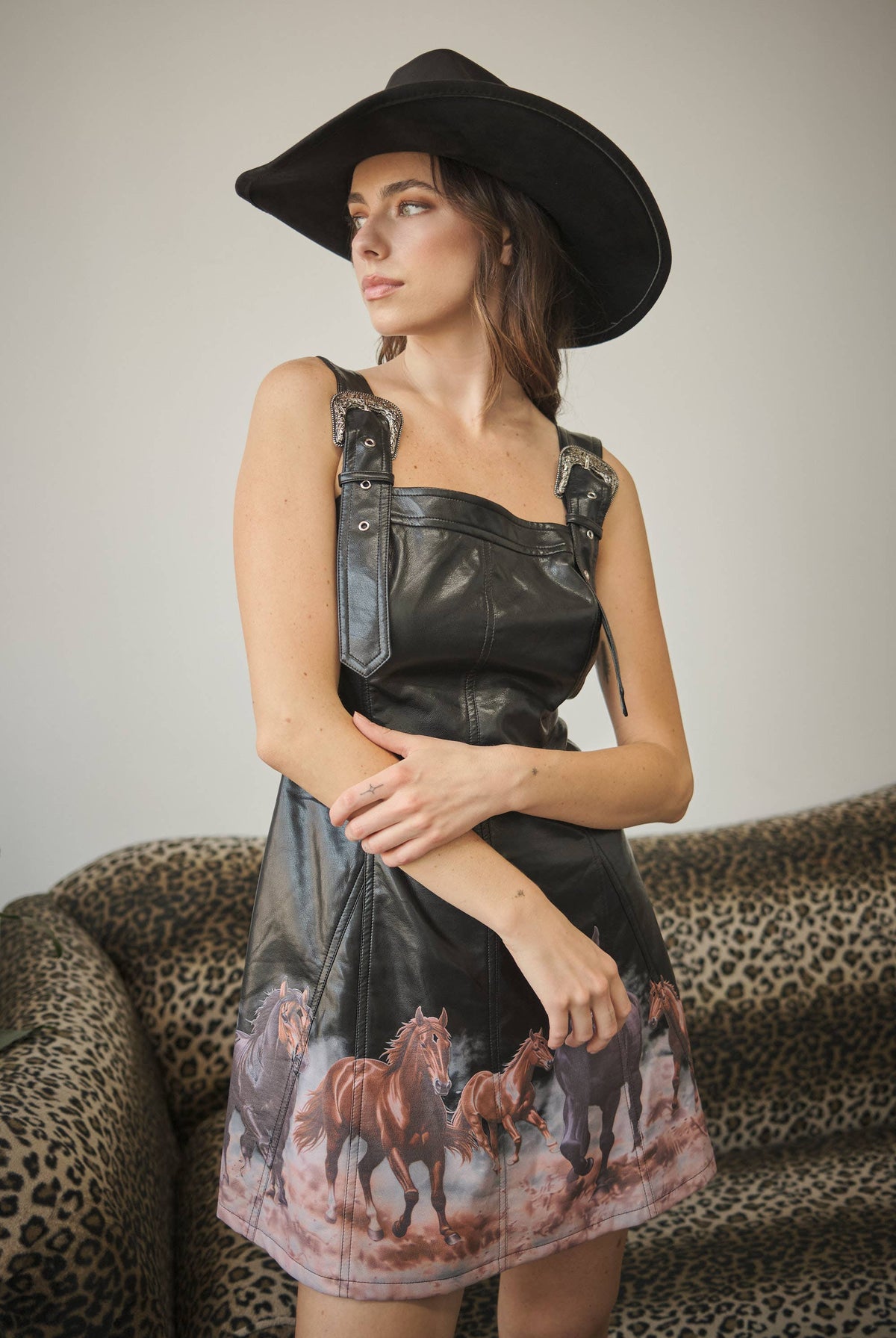 Blue B Western faux leather mini dress with horse print, featuring a fitted silhouette and stylish design.