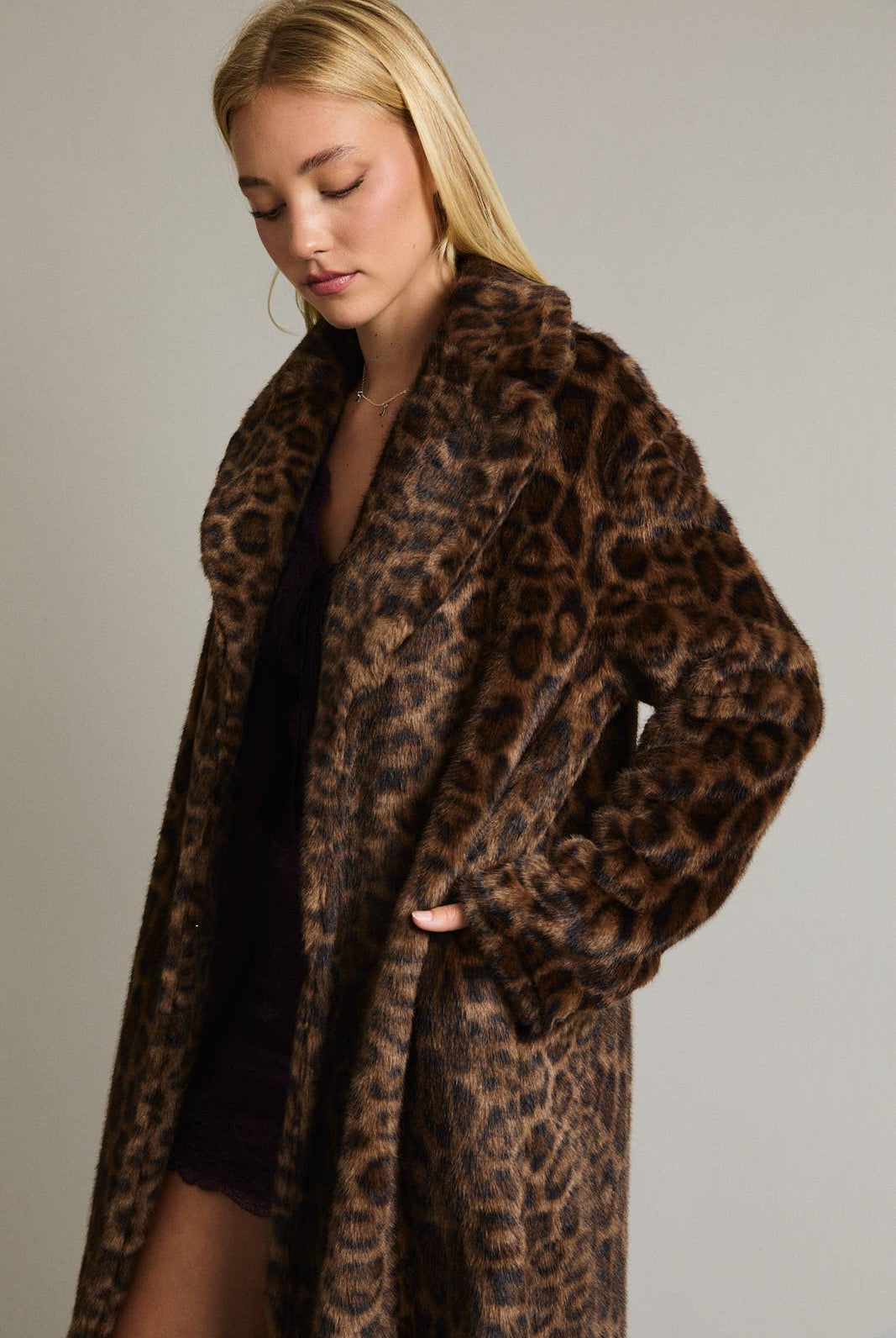 LE LIS faux fur long coat jacket with plush, textured fur in a stylish, elegant design.