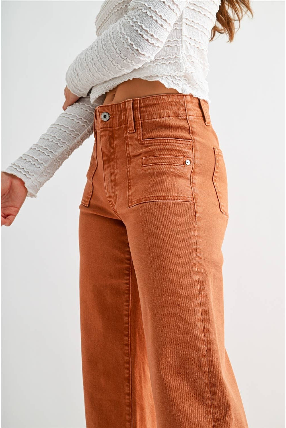 Mica Denim high-rise wide crop jeans with patch pockets, showcasing the fit and stylish design of the denim.