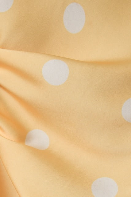 RARA Boutique polka dot satin maxi skirt with elastic waist, flowing design, and stylish pattern for a chic, comfortable look.