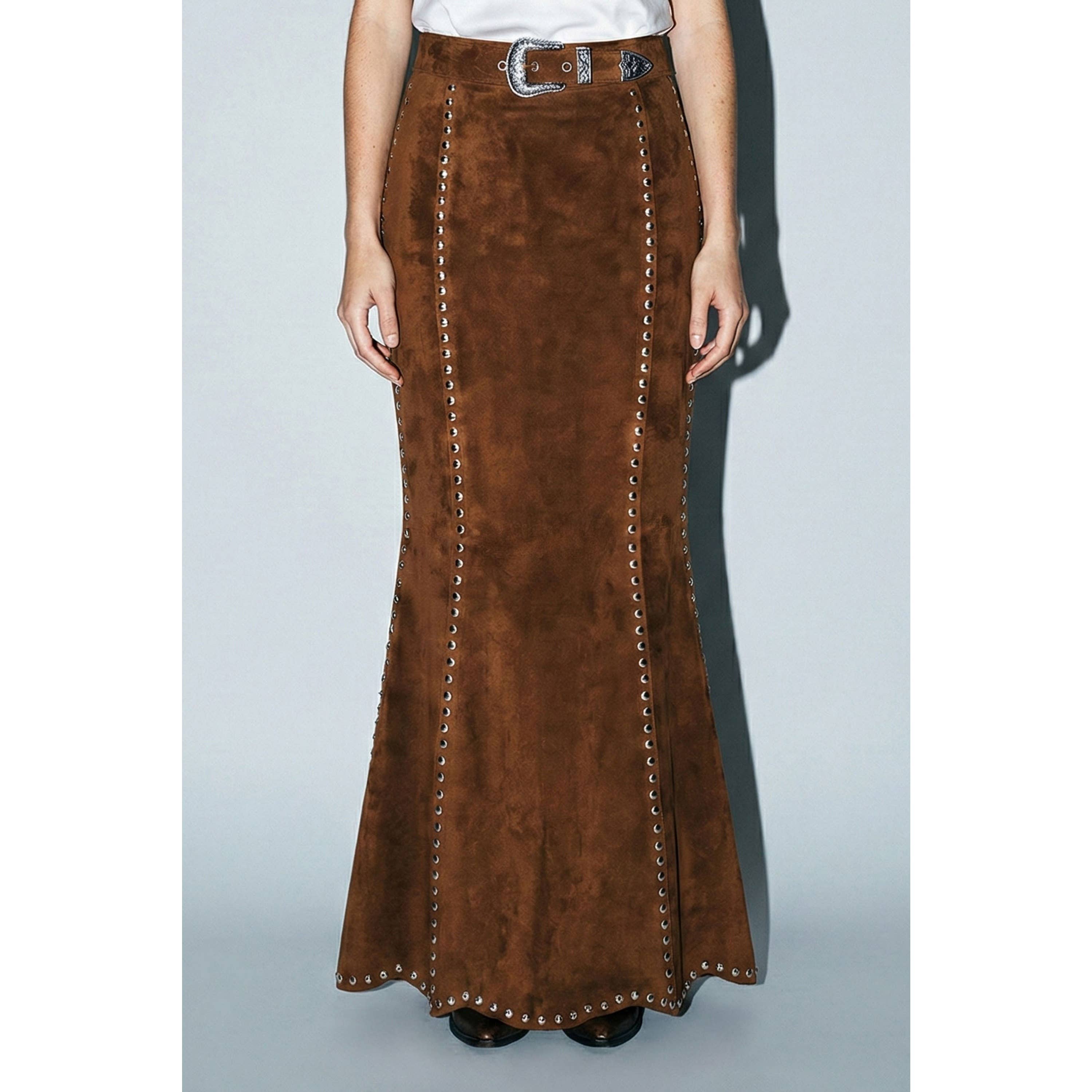Skylar Rose suede studded maxi skirt, featuring a flowing silhouette with metal stud embellishments, styled on a model.