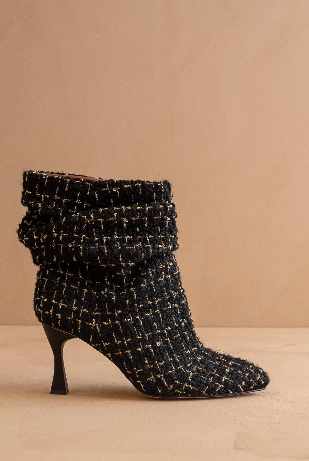 Black tweed slouch heel fall bootie from Oasis Society featuring a stylish design and chunky heel.