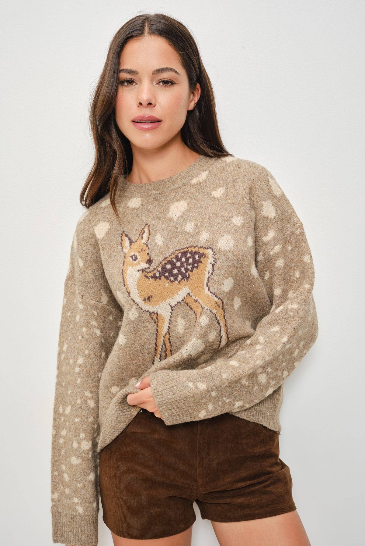 Pretty Garbage Tuesday deer print sweater with a cozy knit design featuring a cute deer motif on the front.
