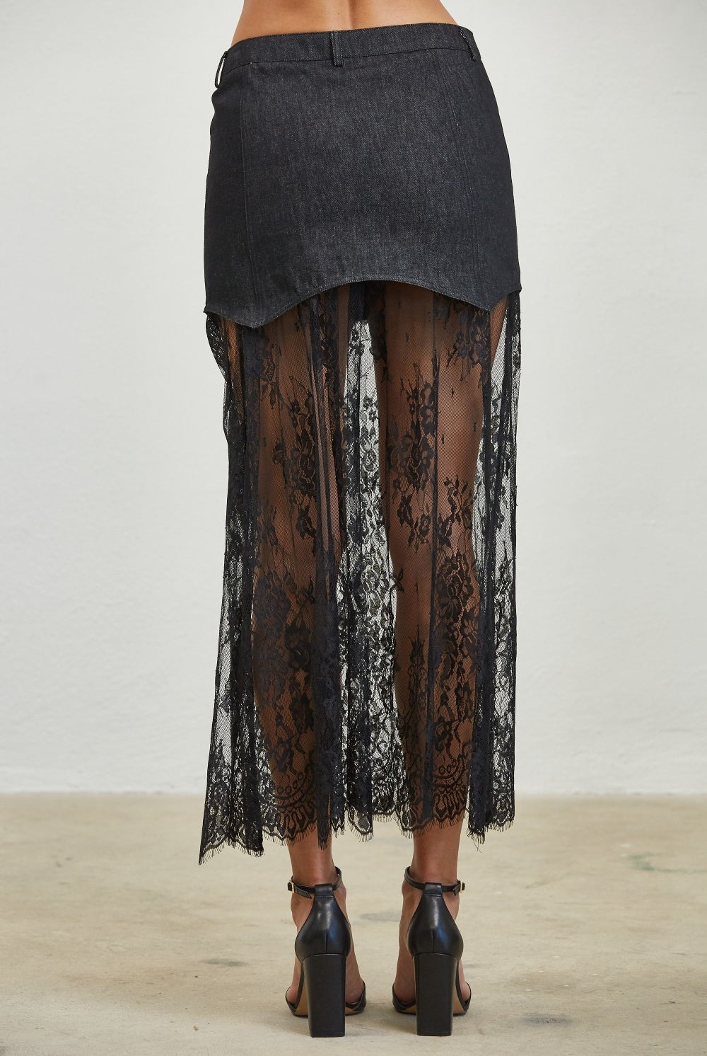 Layered denim lace contrast midi skirt by Edit by Nine, featuring a stylish denim design with lace details.