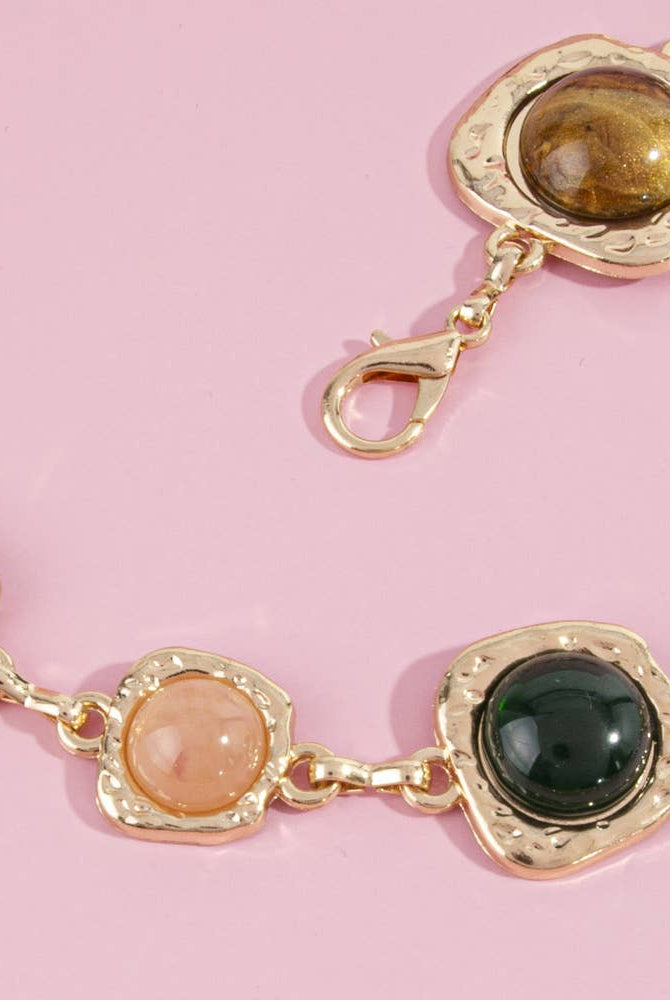 Gemstone cabochon station chain belt with colorful stones and metal links from Collections by Fame Accessories.