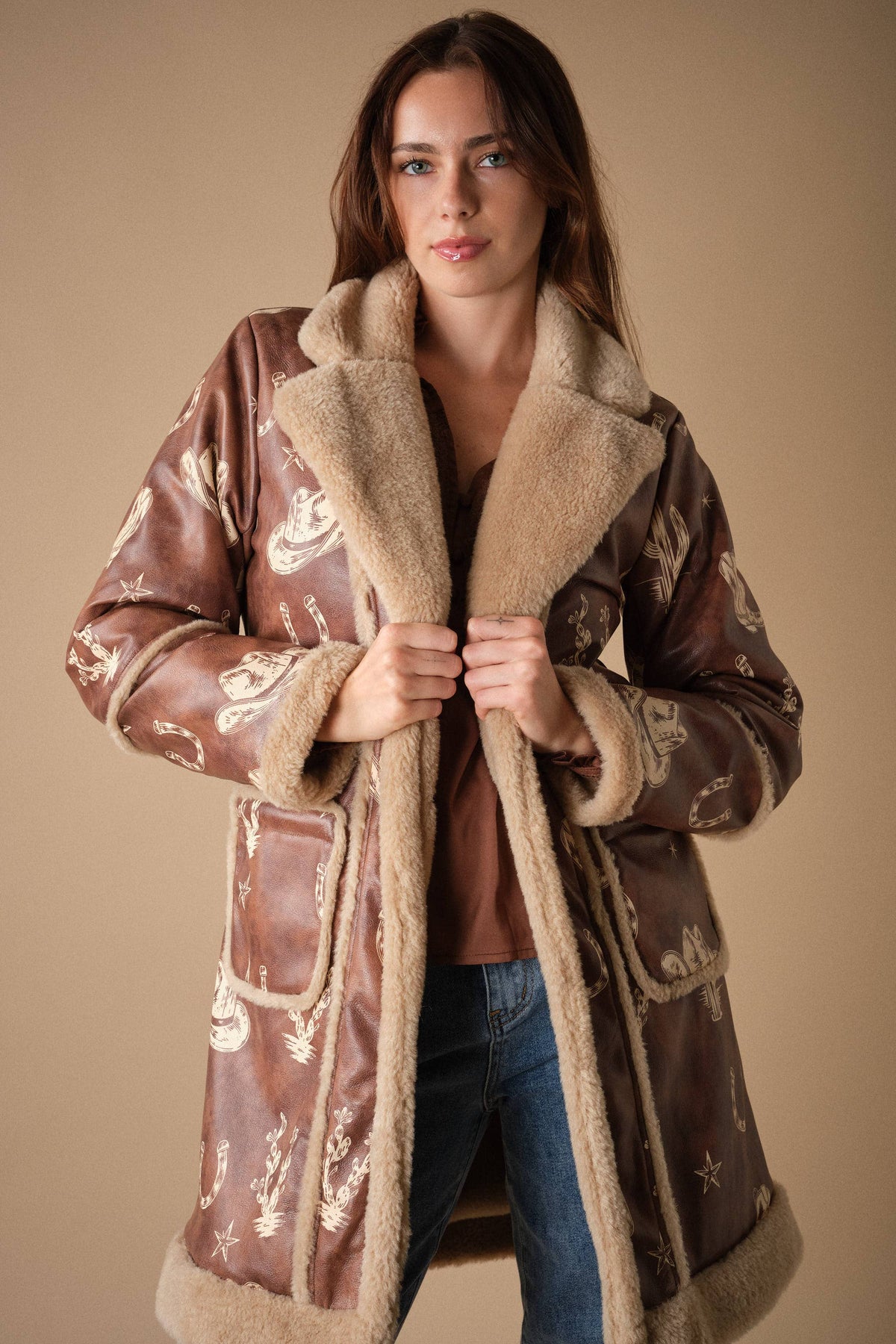 Blue B Western printed faux leather coat with colorful Western-inspired patterns and a stylish tailored fit.