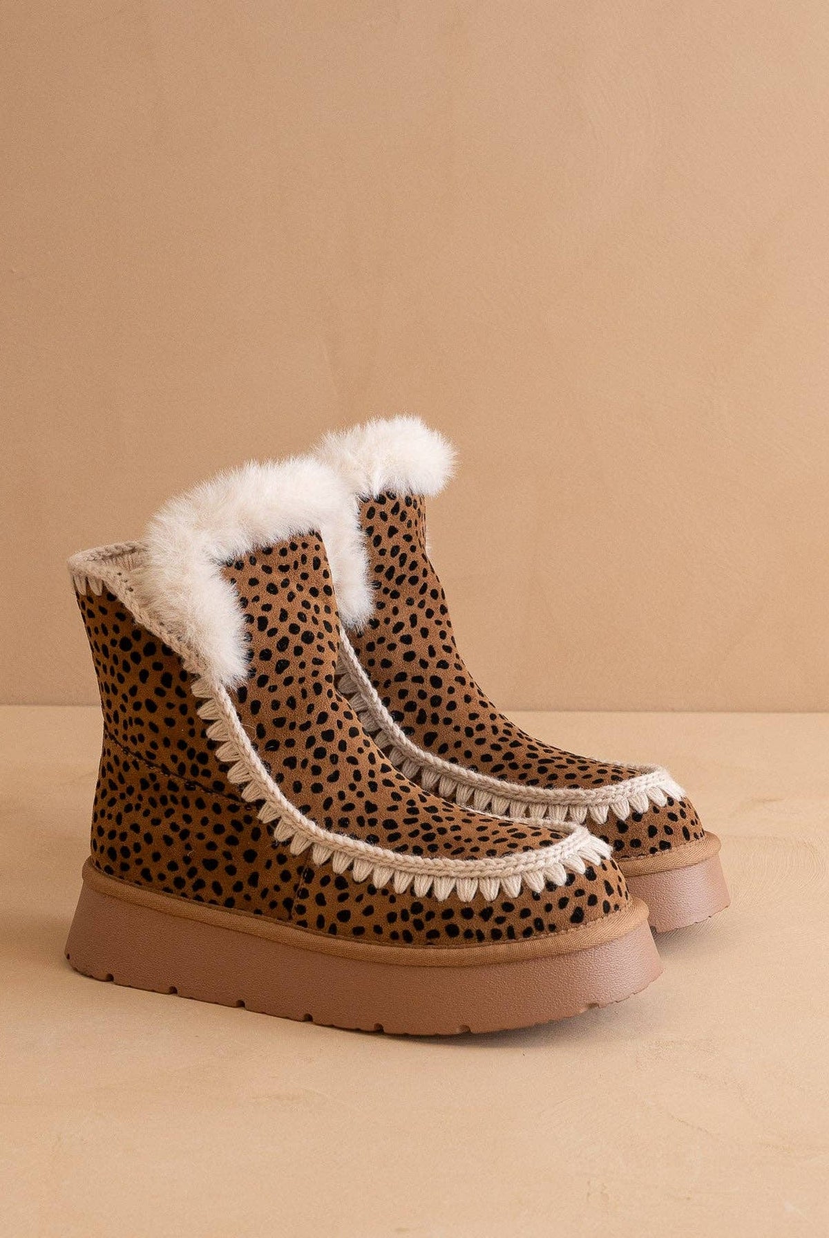 OASIS SOCIETY Joyce dark cheetah shearling trim platform winter boot with rugged sole and cozy shearling lining.