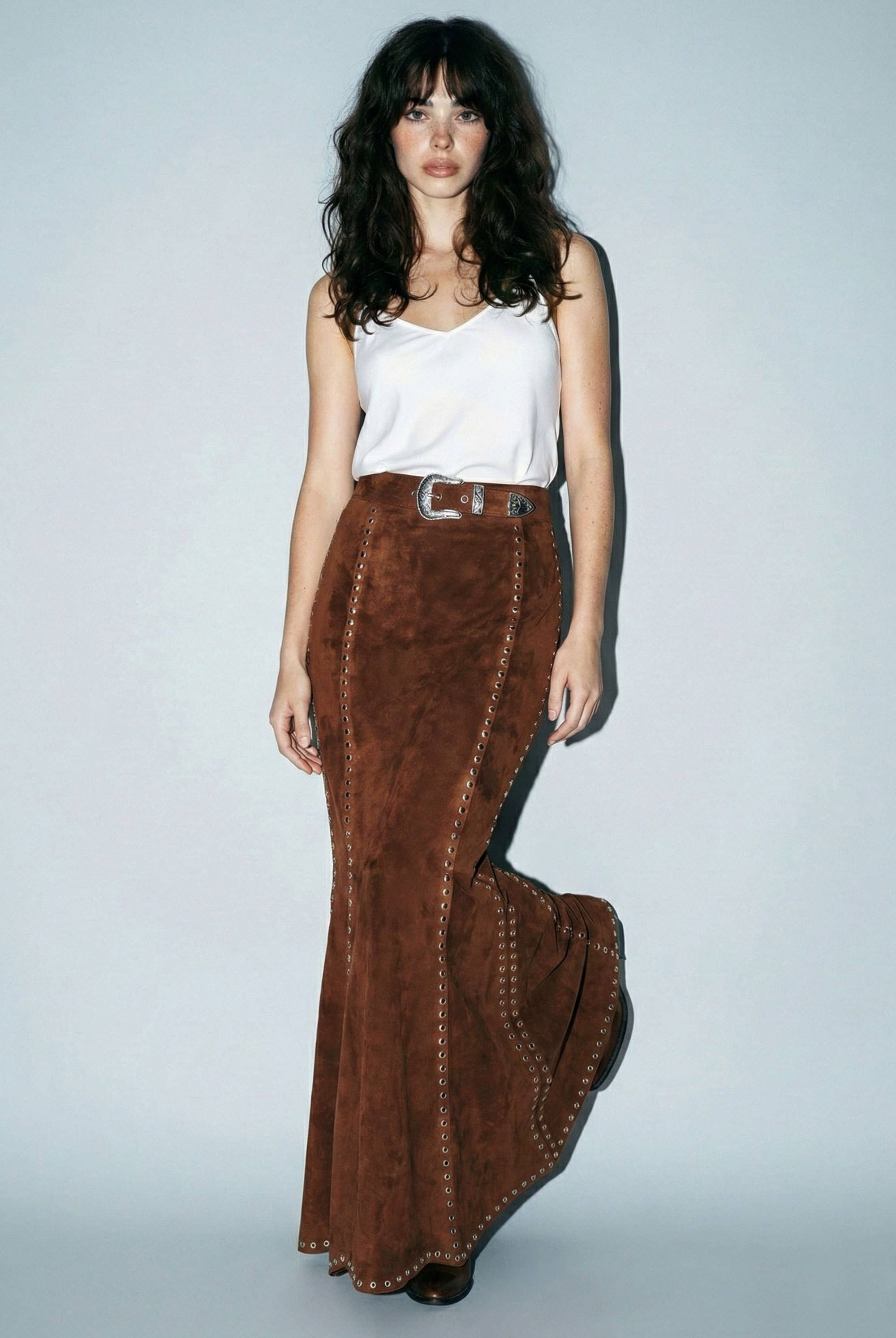 Skylar Rose suede studded maxi skirt with a flowing design and silver stud embellishments on soft suede fabric.