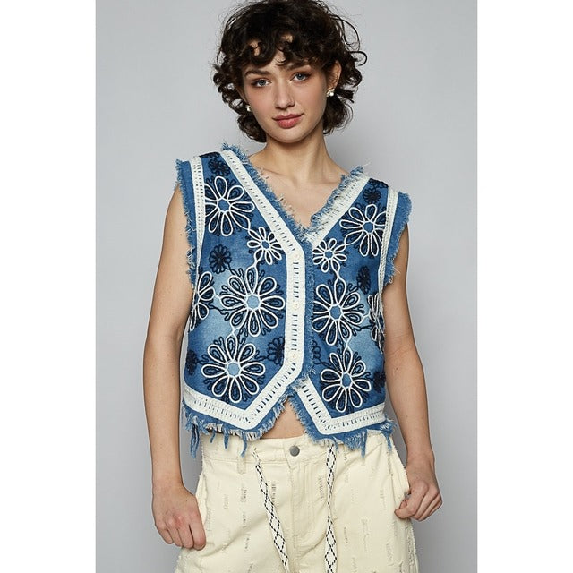 Crochet floral V-neck denim vest by RARA Boutique featuring intricate floral embroidery and sleeveless design.