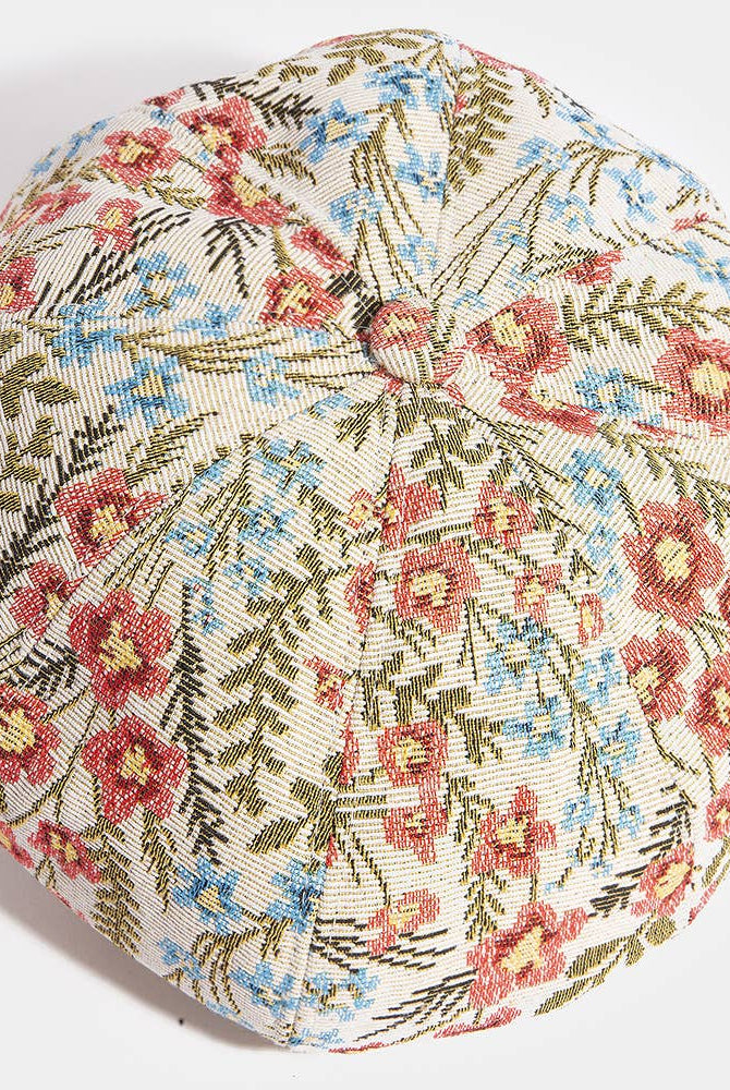 Floral tapestry newsboy cabbie hat by Collections by Fame Accessories with colorful floral pattern and classic newsboy style.
