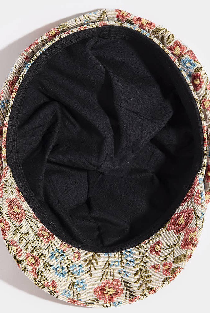 Floral tapestry newsboy cabbie hat by Collections by Fame Accessories, featuring colorful floral fabric and classic newsboy style.