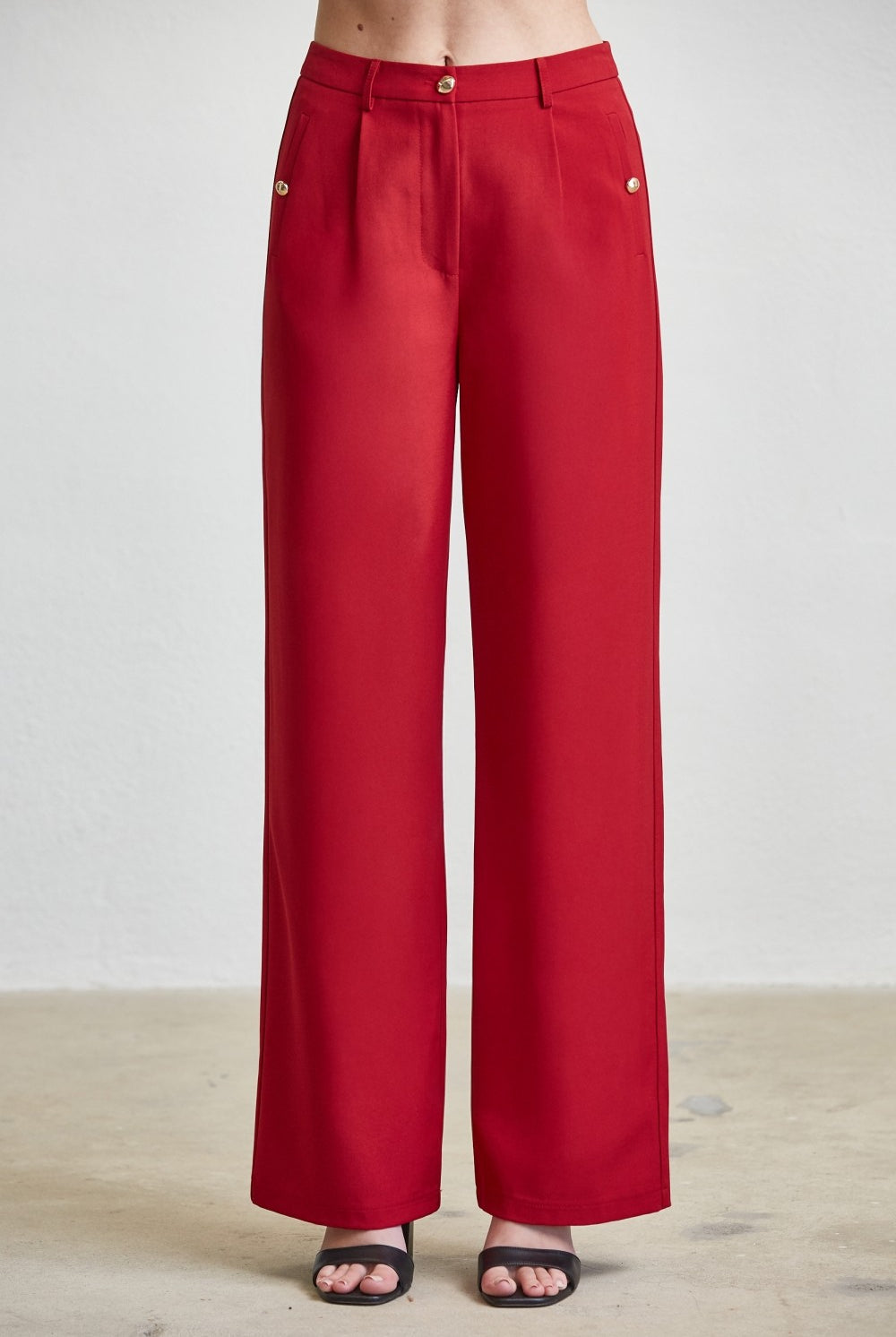 High waist tailored wide-leg trousers with button details by RARA Boutique, featuring a stylish fit and classic design.