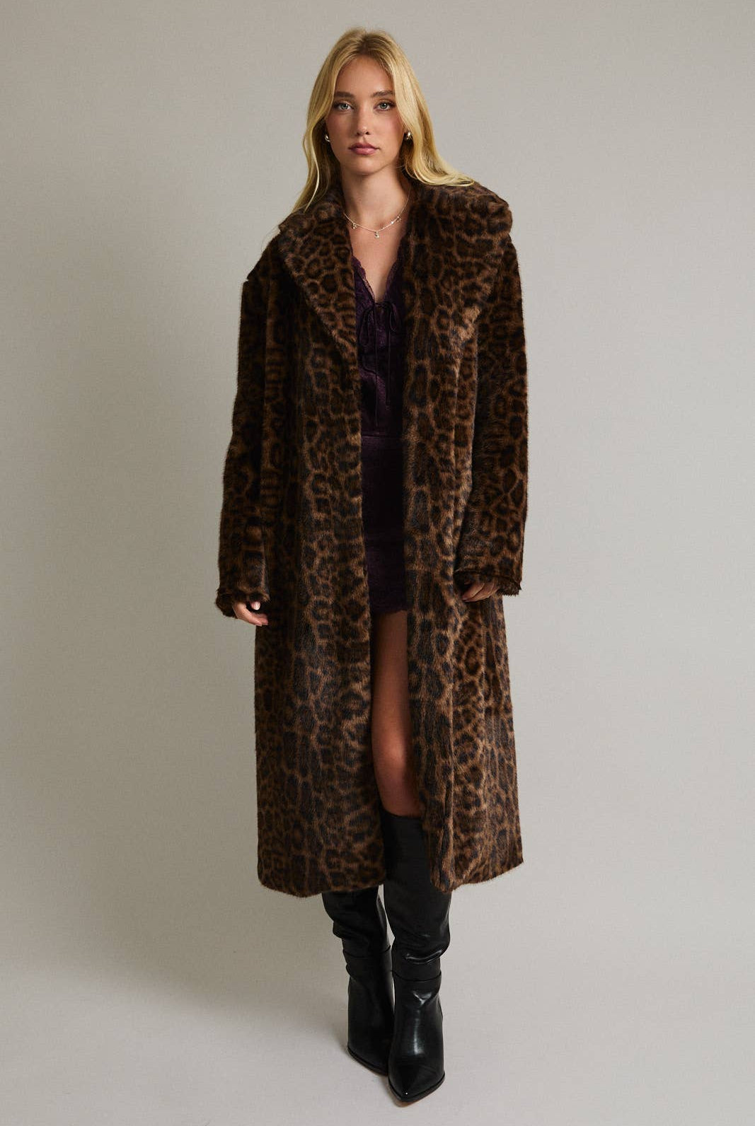 LE LIS faux fur long coat jacket with plush, luxurious texture, stylishly draped on a hanger.
