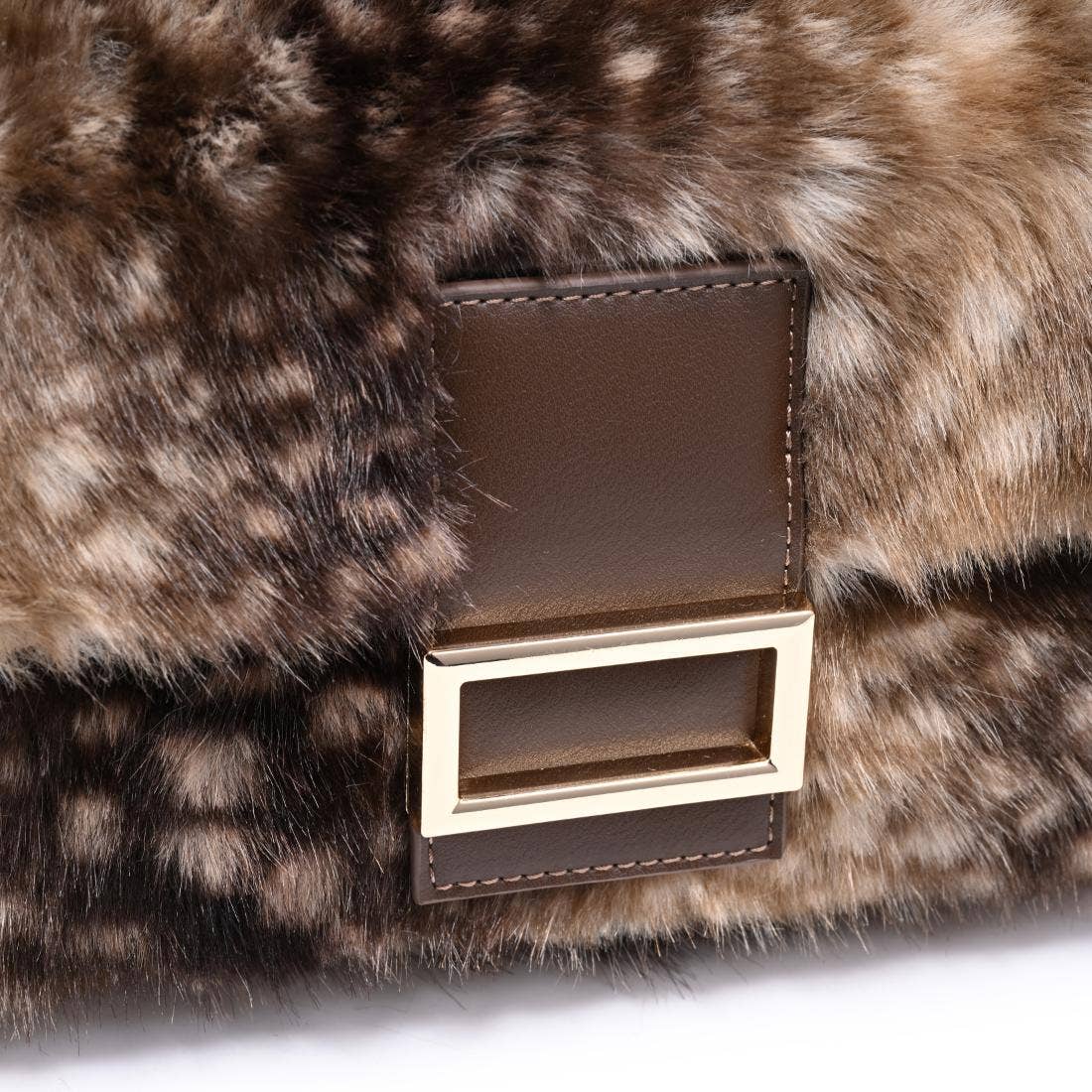 Urban Expressions Tuesday Beverly deer print fur crossbody bag with adjustable strap and zippered closure.