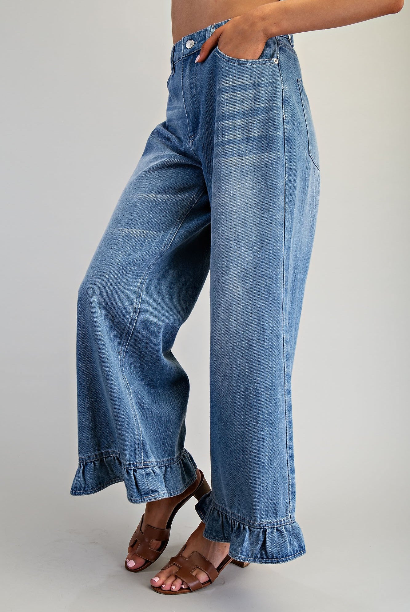 Mineral washed Ruffle Hem Wide Leg Jeans by RARA Boutique, featuring a relaxed fit and stylish ruffle details at the hem.