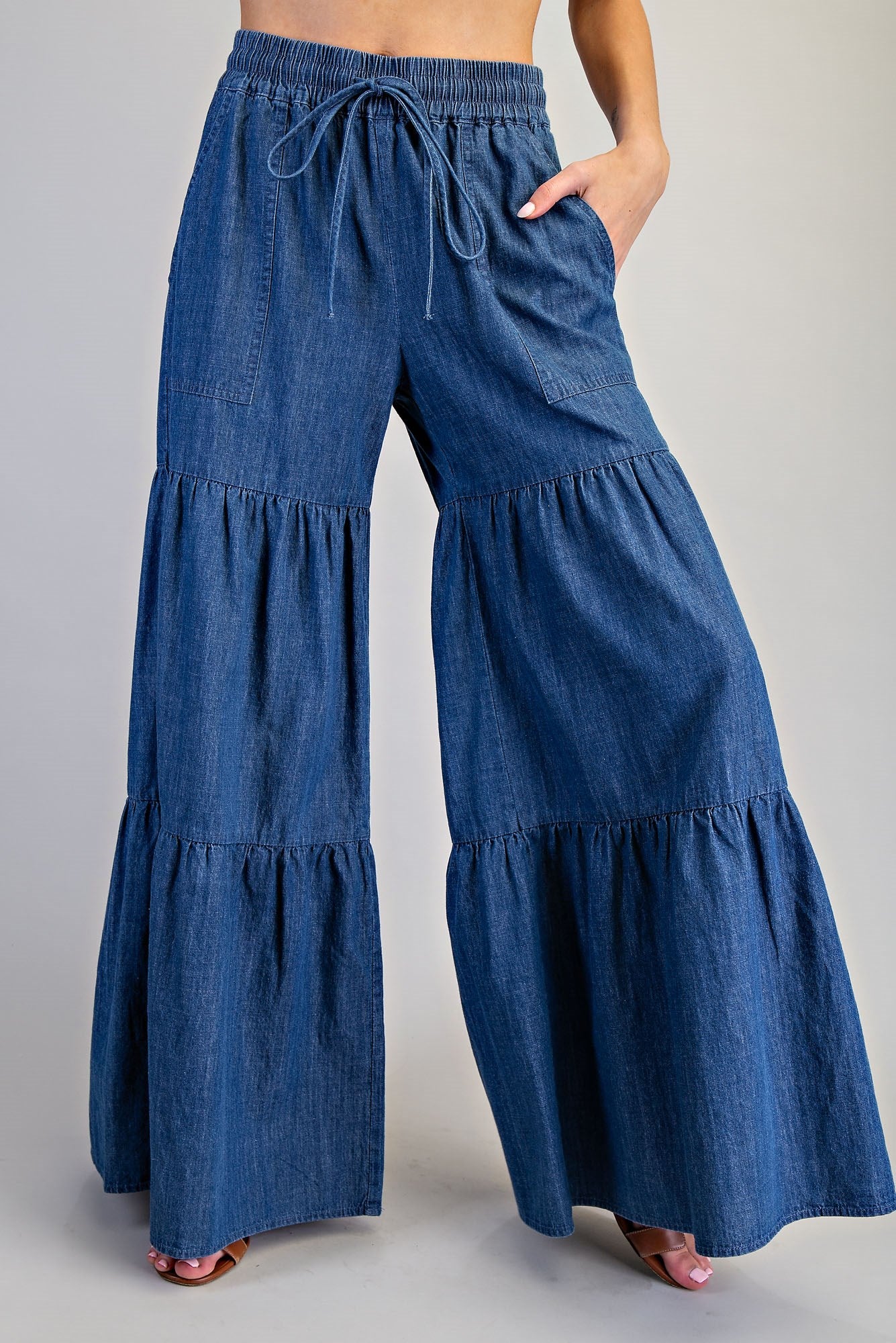 RARA Boutique mineral washed denim palazzo pants with a tiered ultra-wide leg design, stylish and comfortable for casual wear