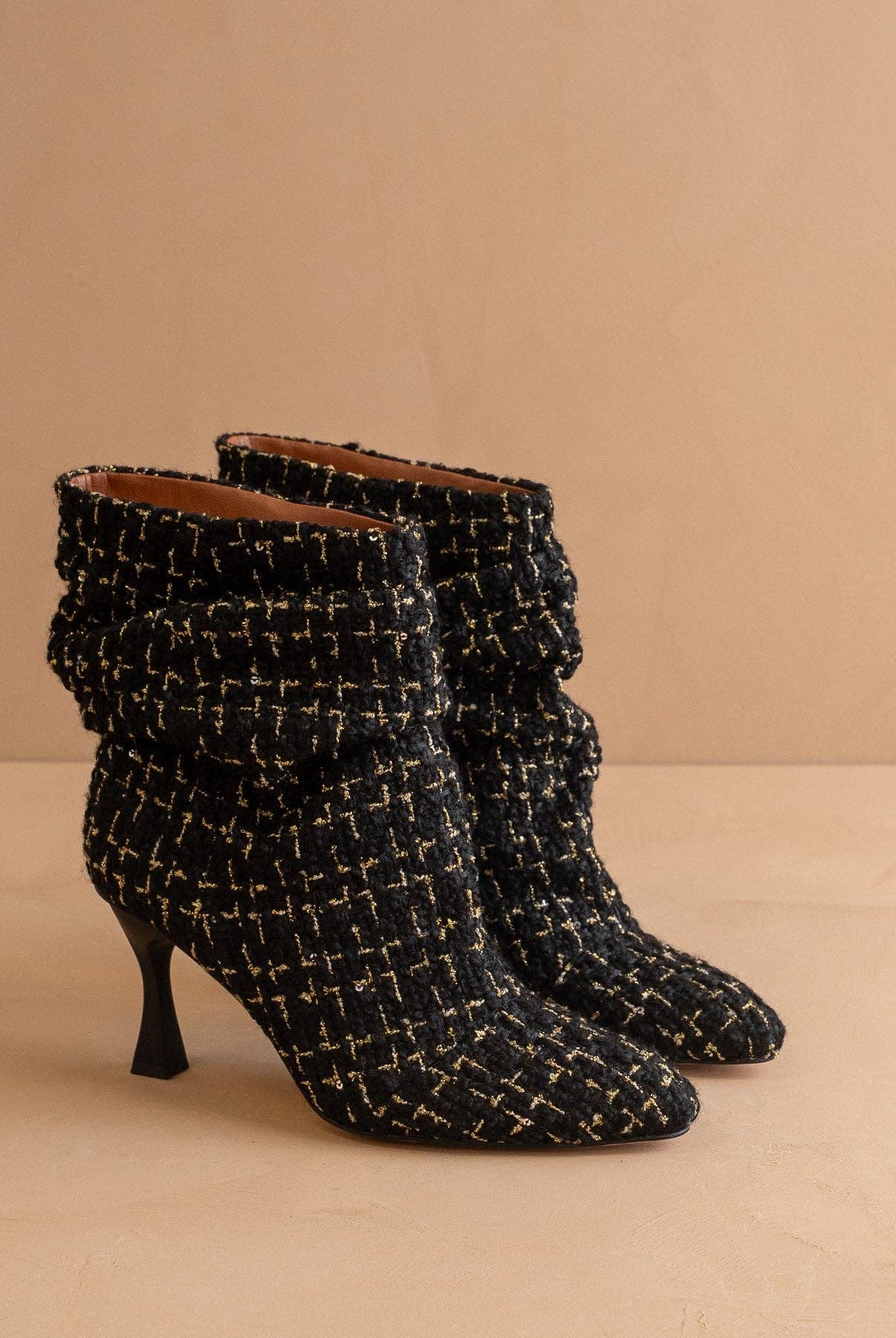 Black tweed slouch heel fall bootie with pointed toe and chunky heel by Oasis Society, featuring a stylish, textured design.