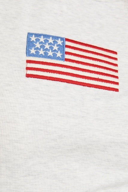 Baby T-shirt with embroidered American flag design, ribbed cotton fabric, by RARA Boutique, featuring a stylish Le Lis embroidered detail.