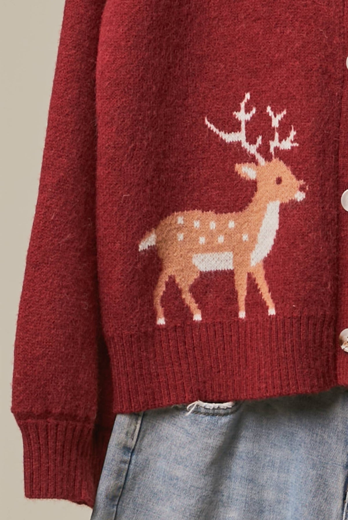 Mello Reindeer Fair Isle knit cardigan featuring festive holiday patterns in cozy wool blend with button closure.