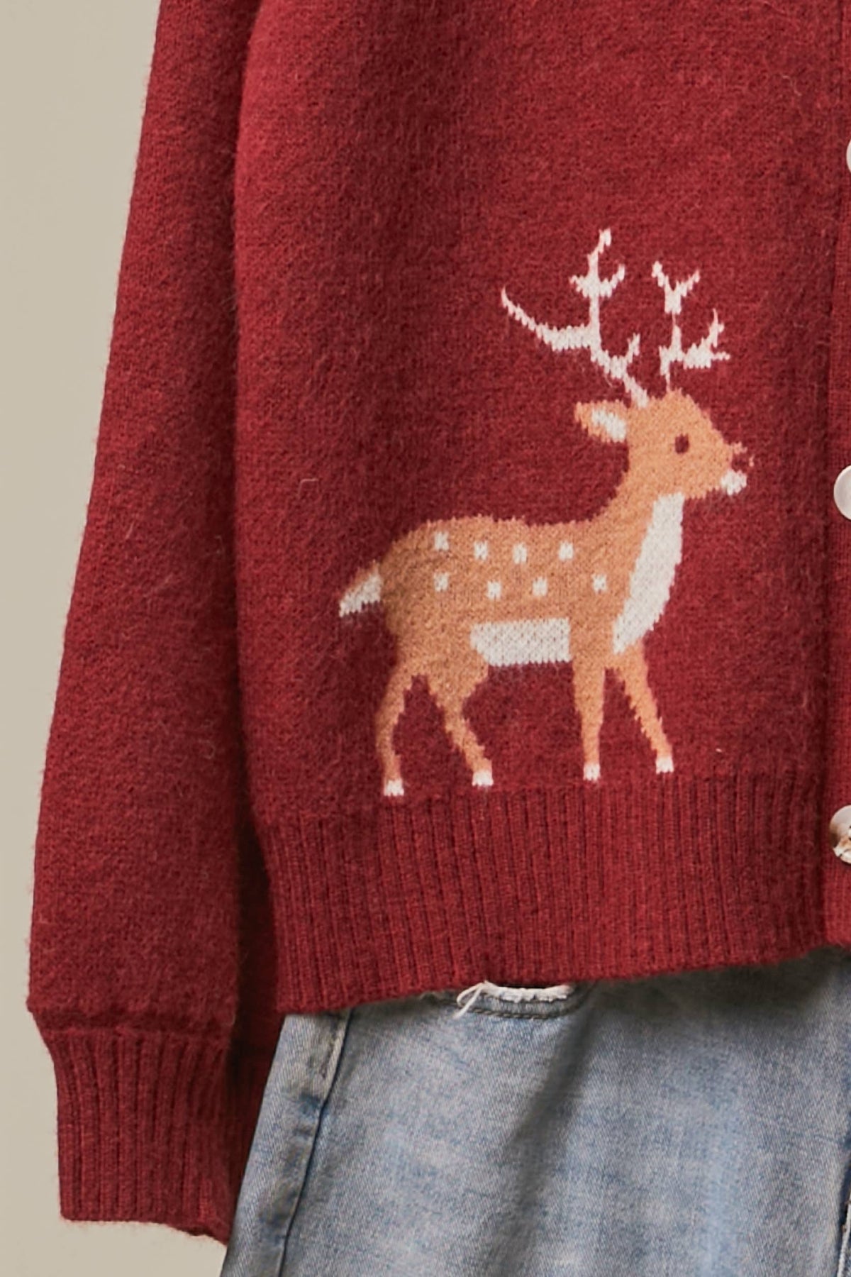 Mello Reindeer Fair Isle knit cardigan featuring festive holiday patterns in cozy wool blend with button closure.