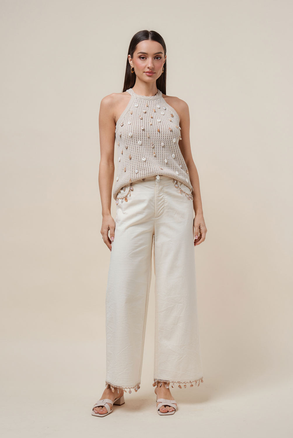 Seashell embellished open-knit halter tank top by RARA Boutique, featuring a stylish design with seashell details.