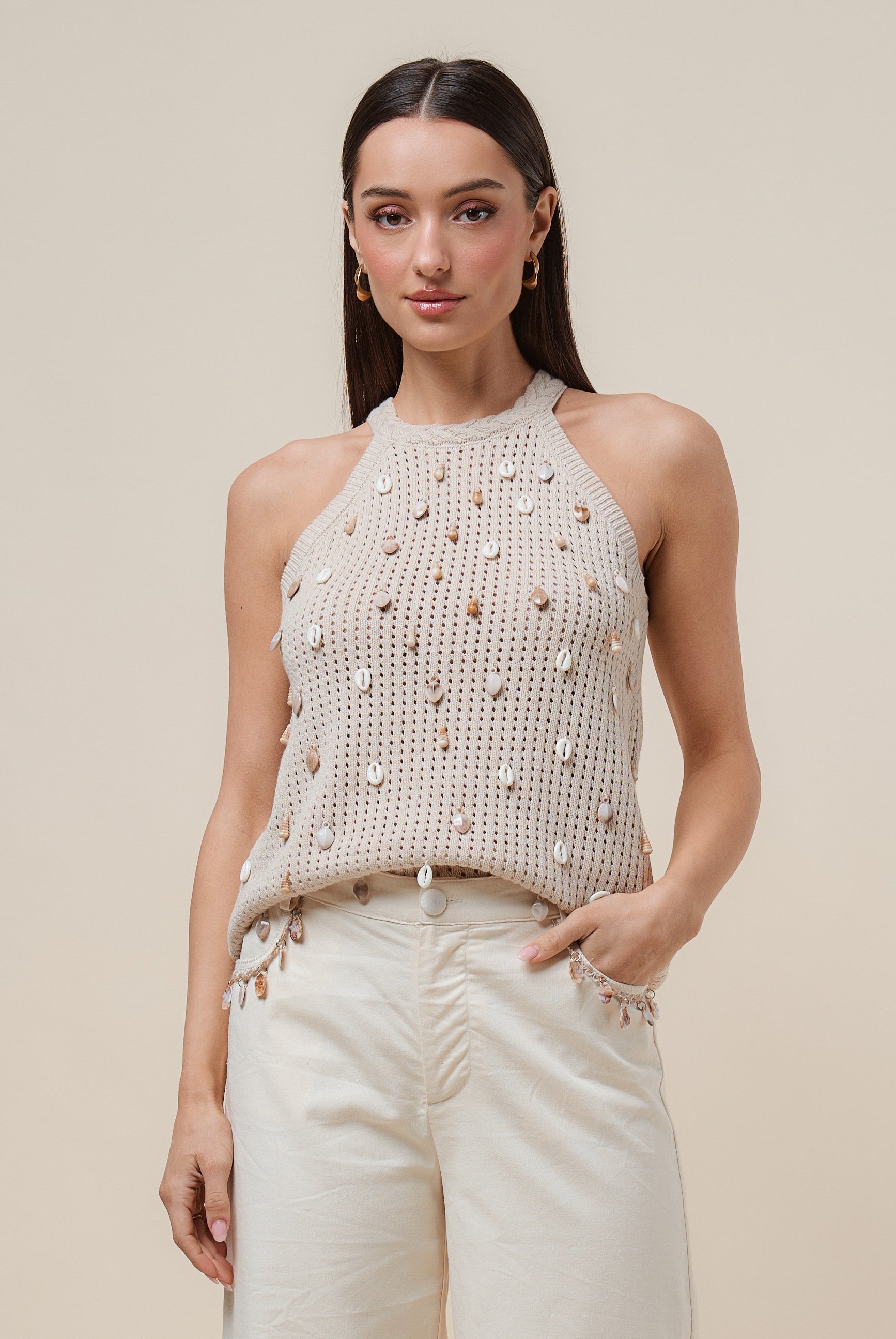Seashell embellished open-knit halter tank top by RARA Boutique featuring a stylish, lightweight design with a relaxed fit.