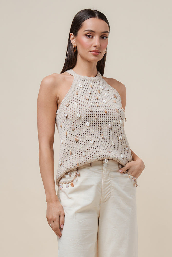 Seashell embellished open knit halter tank top by RARA Boutique, featuring a stylish design with shell details on the fabric.