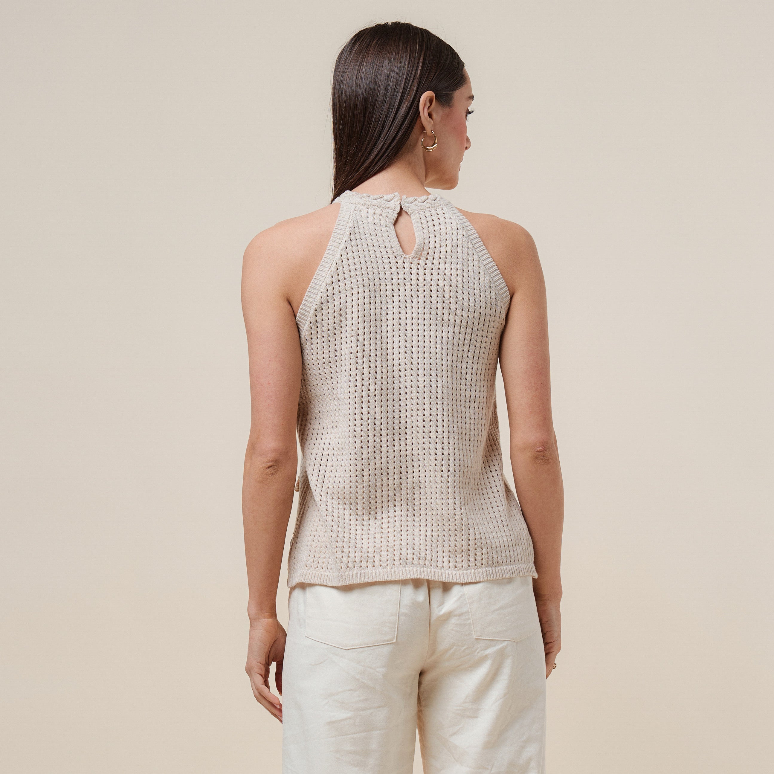 Seashell embellished open-knit halter tank top by RARA Boutique featuring a stylish, lightweight design with natural seashell accents.