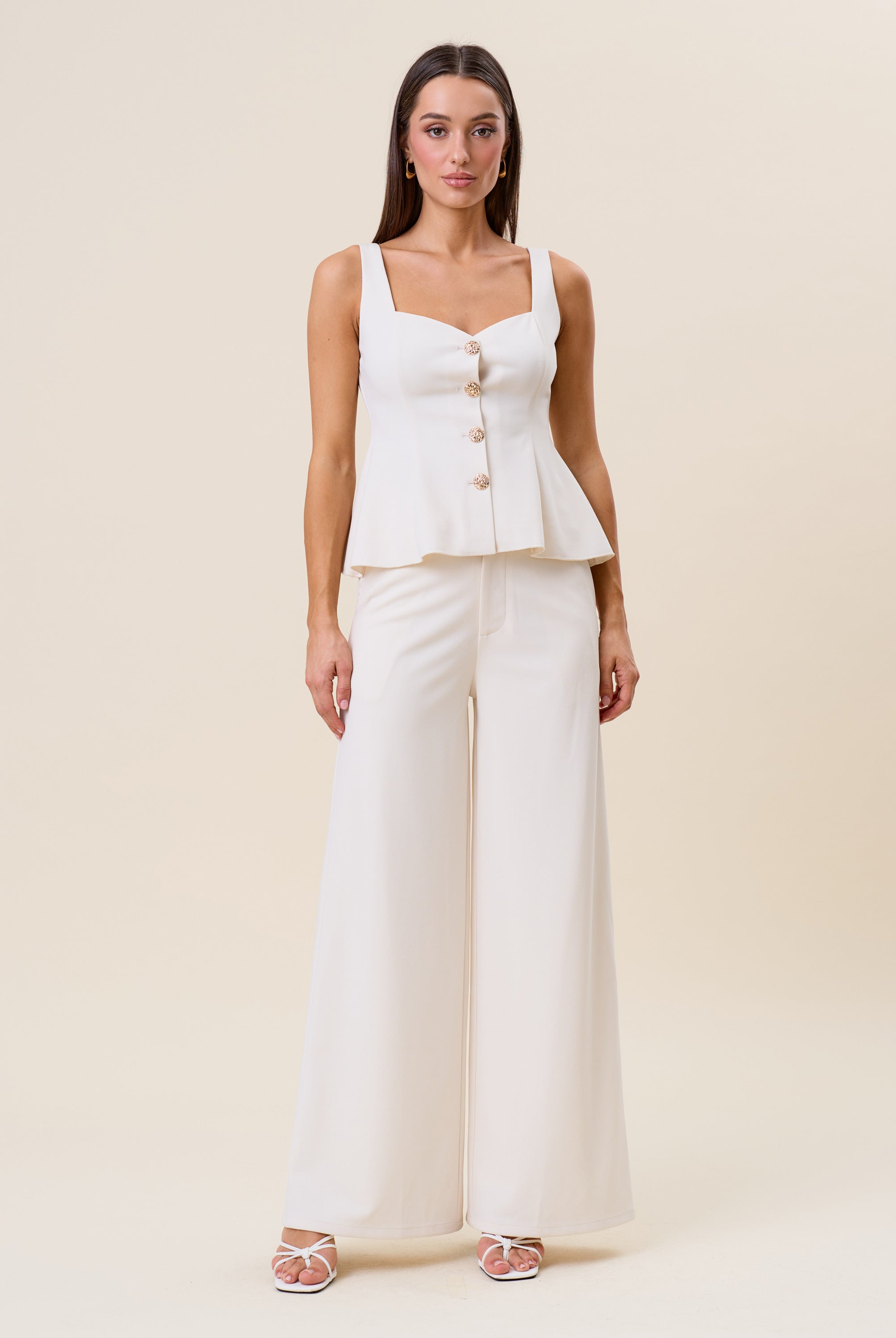 High waist tailored wide-leg trousers by RARA Boutique, featuring a sleek fit and classic style in the image.
