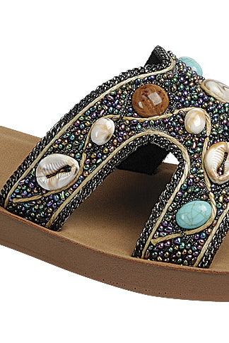 Black boho H-strap slide sandals with seashell and beaded details by RARA Boutique, featuring a stylish, casual design.