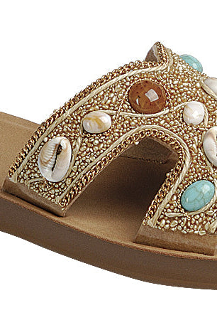 Beaded boho H-strap slide sandals with seashell accents by RARA Boutique, featuring a comfortable open-toe design.