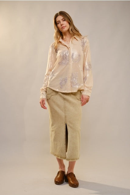 Blue Western embroidered sequin button-down shirt from RARA Boutique displayed on a hanger with intricate detailing.