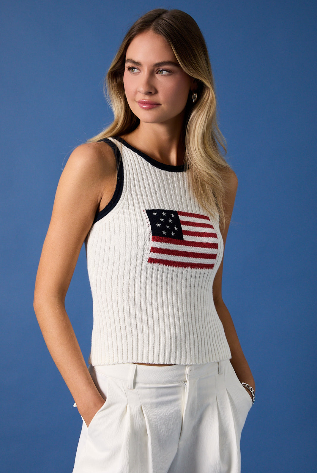 White and navy American flag sleeveless knit tank top by RARA Boutique, featuring patriotic star and stripe design.
