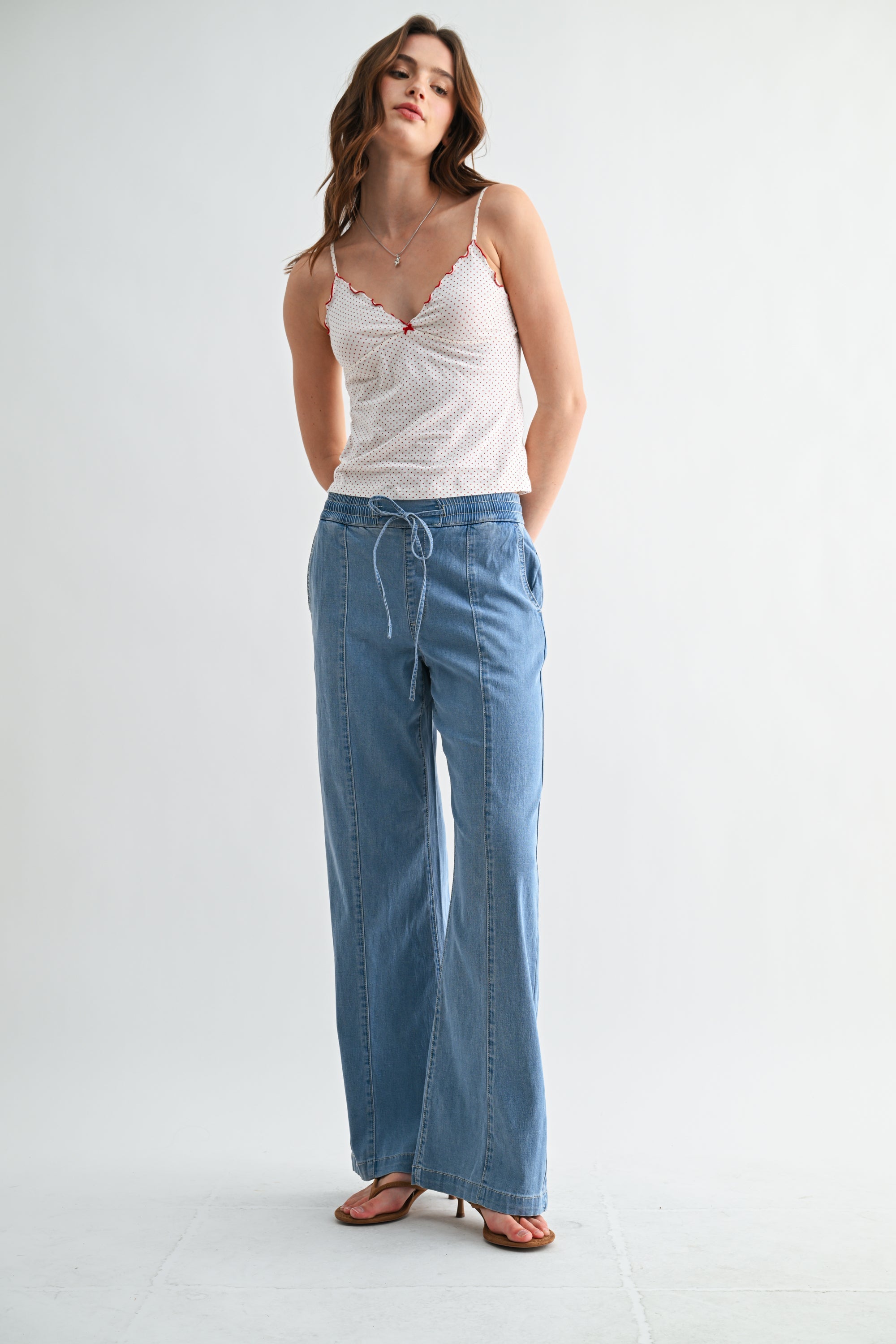 Lightweight denim jogger pants with elastic waist from RARA Boutique, showing relaxed fit and casual style in a natural pose.