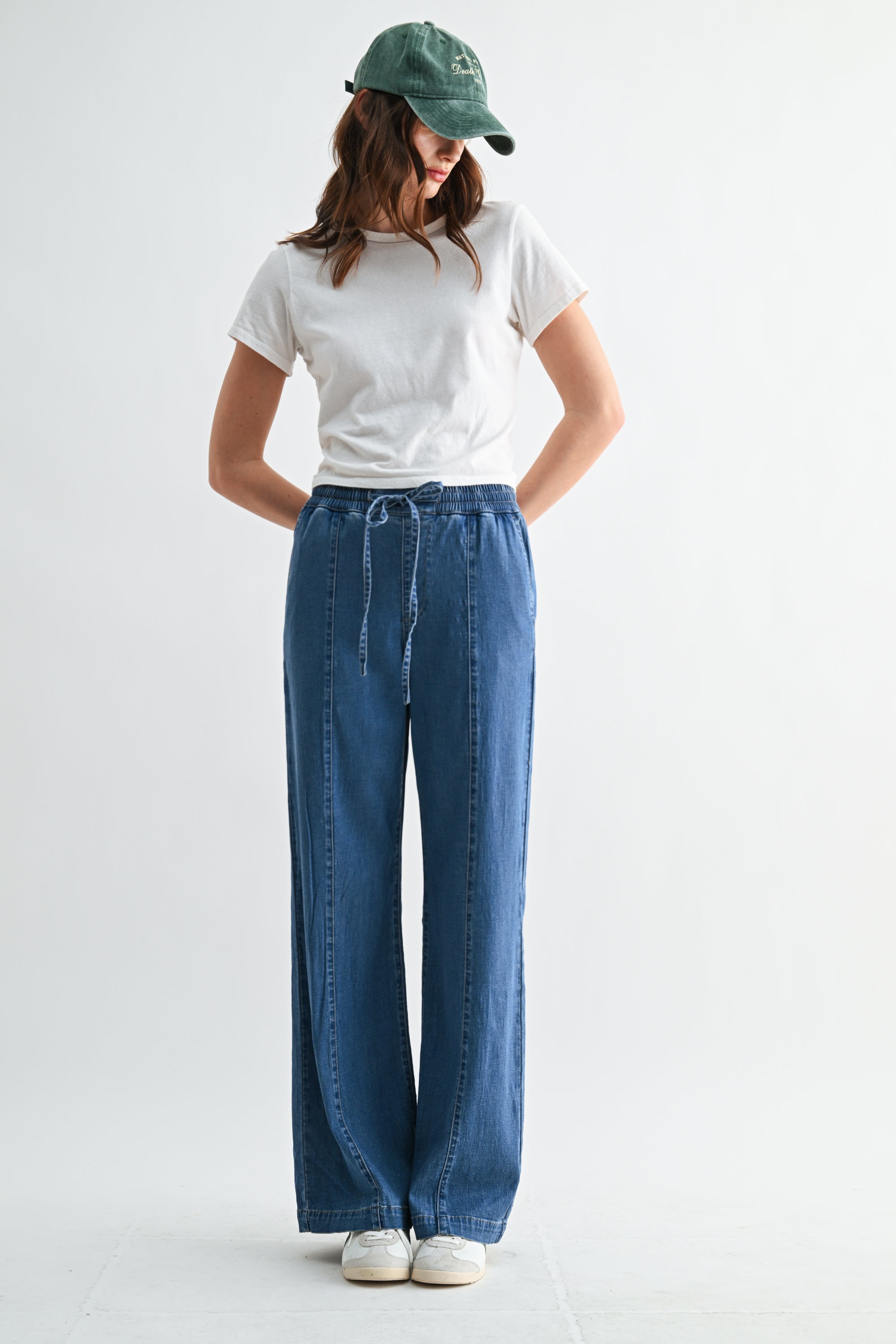 Lightweight denim jogger pants with elastic waist from RARA Boutique, featuring a relaxed fit and casual style.
