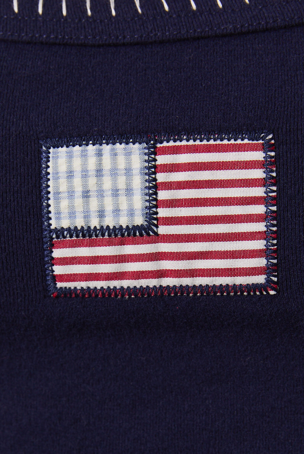 Navy American flag patchwork cropped tank top with contrast trim from RARA Boutique, featuring a stylish sleeveless design.