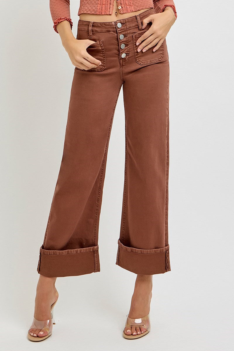 Risen wide leg patch pocket button fly jeans in espresso color with classic denim style and relaxed fit.