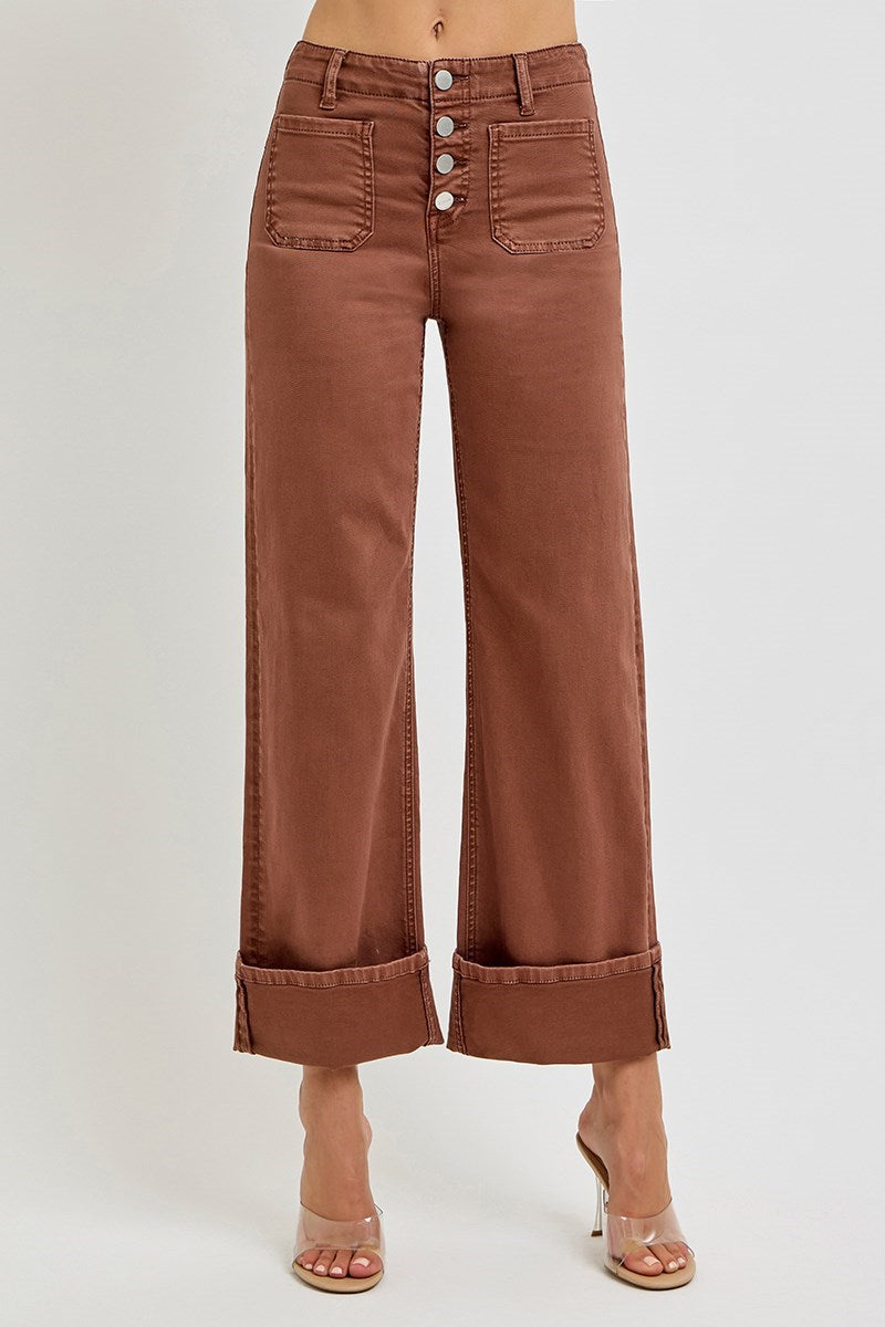 Risen wide leg patch pocket button fly jeans in espresso with relaxed fit and classic denim look.