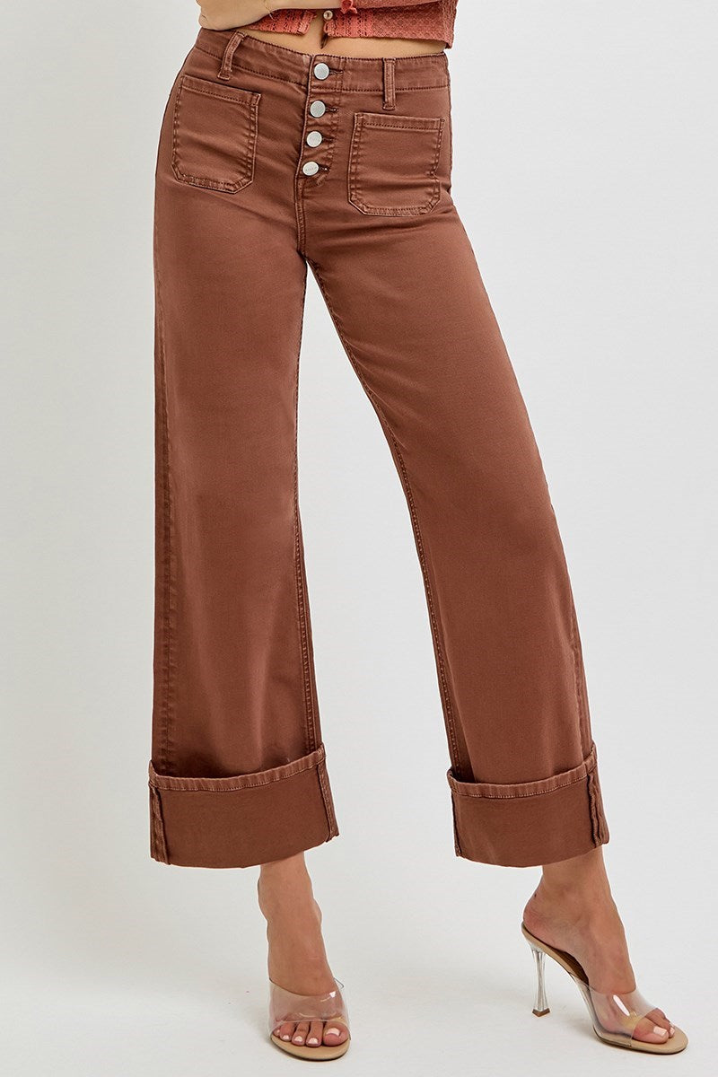 Risen wide leg patch pocket button fly jeans in espresso wash, featuring relaxed fit and classic denim style.