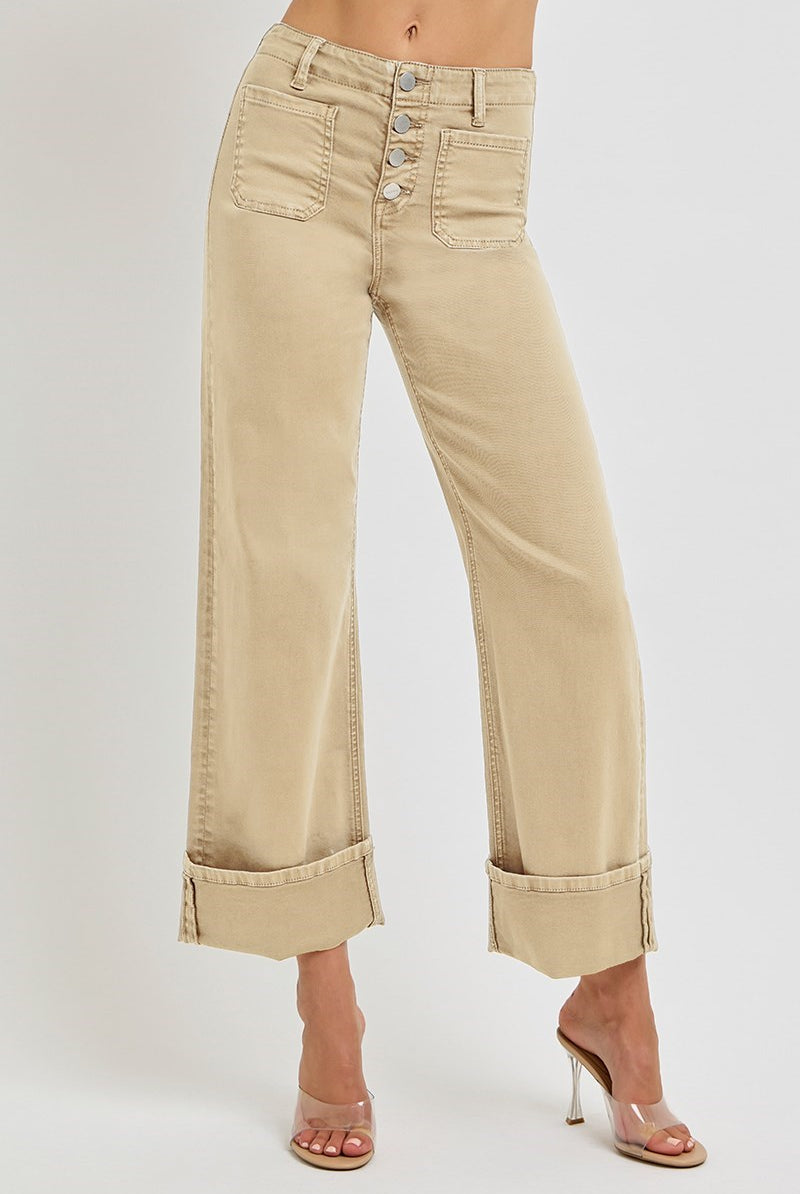 Light brown Risen wide leg jeans with patch pockets and button fly, featuring a relaxed fit and stylish design.