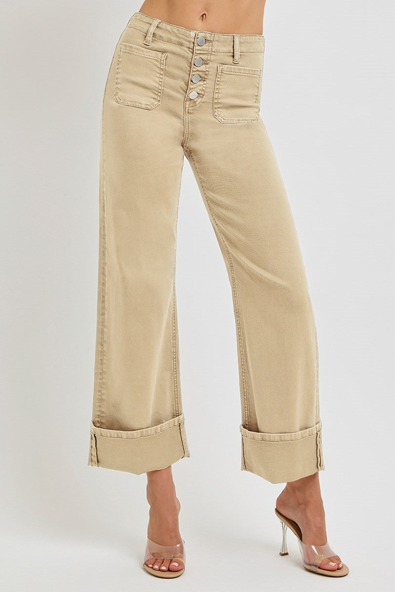 Light brown Risen wide leg jeans with patch pockets and button fly, featuring a relaxed fit and stylish design.