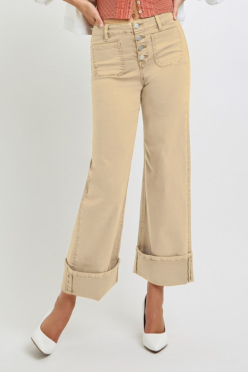 Light brown Risen wide leg jeans with patch pockets and button fly, featuring a relaxed fit and stylish design.