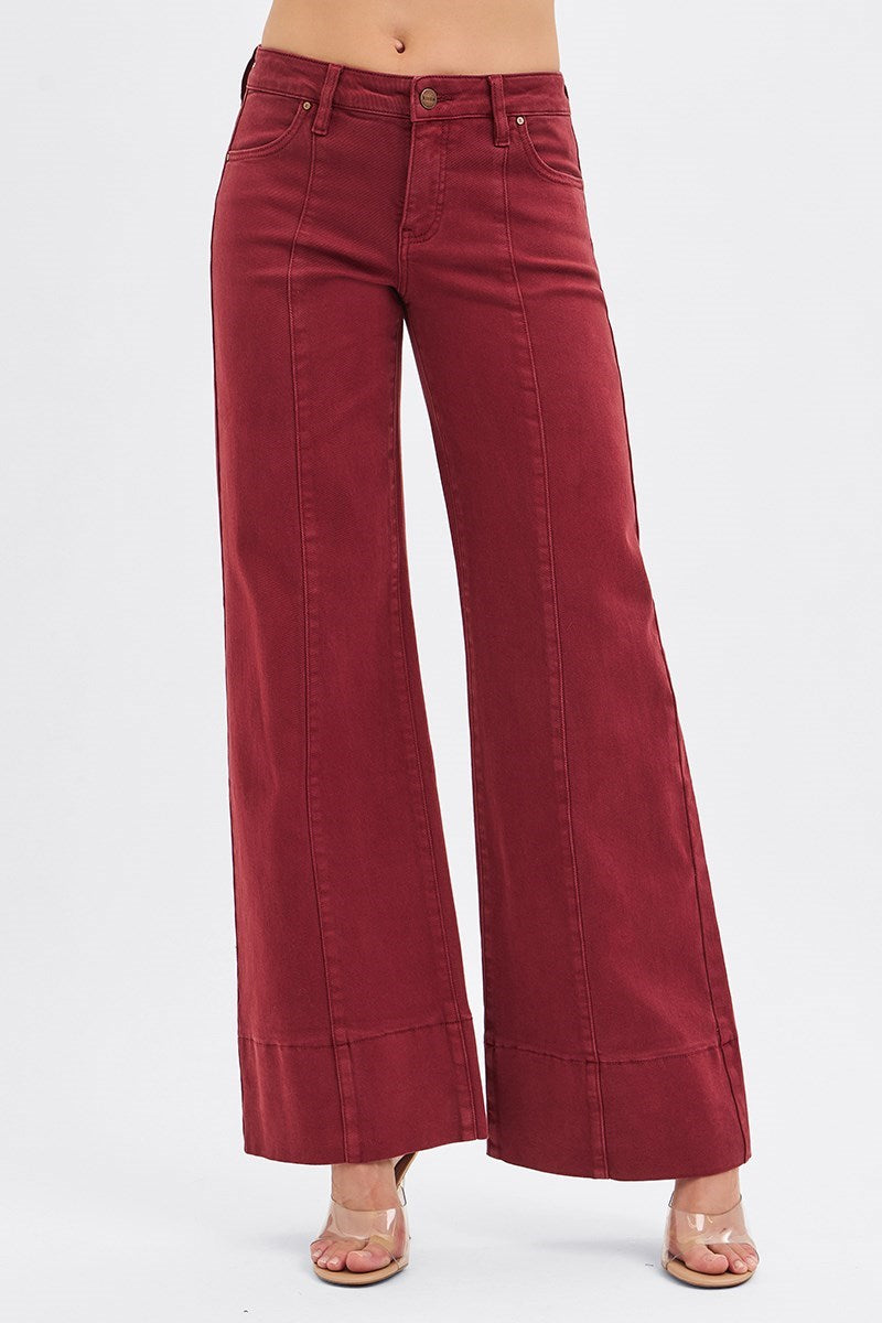 RARA Boutique wine-colored tummy control mid-rise wide-leg jeans with pin tucks and wide hems, styled for a casual look.