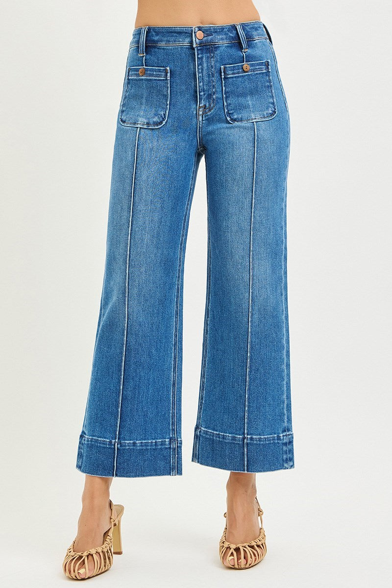 Risen pintuck square patch pocket wide-leg cropped jeans in medium wash with relaxed fit and stylish design.